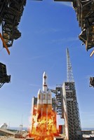 A Delta IV Heavy Launch Vehicle launches from Vandenberg Air Force Base Fine Art Print