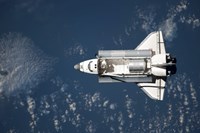 Aerial view of Space Shuttle Discovery over Earth Fine Art Print