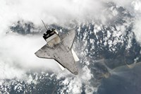 The Underside of Space Shuttle Discovery as the Shuttle approaches the International Space Station Fine Art Print