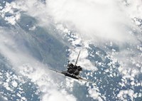 Rear view of the Three main Engines of Space Shuttle Discovery as the Shuttle approaches the International Space Station Fine Art Print