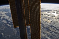 Solar Panels of the International Space Station Backdropped by a Blue and White Earth Fine Art Print