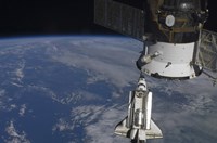 Space Shuttle Endeavour as it Approaches a Docked Russian Spacecraft Fine Art Print