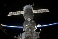 Earth's Limb Intersects a Soyuz Spacecraft Fine Art Print