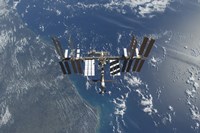 The International Space Station above Earth Fine Art Print
