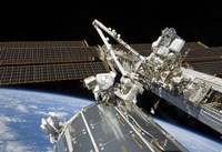 Astronauts Perform a Series of Tasks on the Exterior of the International Space Station Fine Art Print