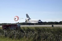 Space Shuttle Atlantis Unfurls its Drag Chute upon Landing at Kennedy Space Center, Florida Fine Art Print