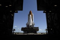 Atlantis Rolls Toward the Open Doors of the Vehicle Assembly Building at Kennedy Space Center Fine Art Print