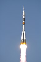 The Soyuz TMA-12 Spacecraft Lifts Off into a Cloudless Sky Fine Art Print