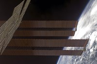 International Space Station's Solar array Panels and Earth's Horizon Fine Art Print