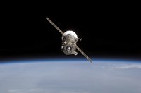 The Soyuz TMA-11 Spacecraft Above Earth's Horizon Fine Art Print