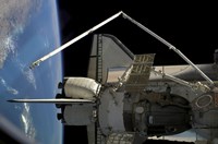 A Soyuz Vehicle and the Space Shuttle Discovery Docked to the International Space Station Fine Art Print