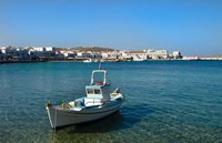 Mykonos, Greece Boat off the island with view of the city behind Fine Art Print