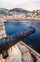 Cannon, hydrofoil boat, harbor, Hydra Island, Greece Fine Art Print