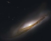 NGC 3190, a spiral galaxy in the Constellation Leo Fine Art Print