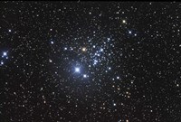 NGC 457 is an open star cluster in the Constellation Cassiopeia Fine Art Print