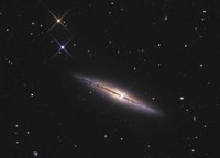 NGC 4013 is an edge-on unbarred spiral galaxy in the Constellation Ursa Major Fine Art Print