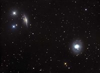 Spiral galaxies NGC 1068 and NGC 1055 located in the Constellation Cetus Fine Art Print