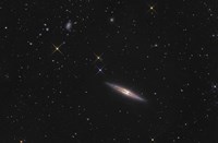 NGC 4013 is an edge-on unbarred spiral galaxy in the Constellation Ursa Major Fine Art Print