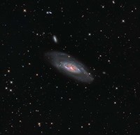 Messier 106, a spiral galaxy in the Constellation Canes Venatici Fine Art Print
