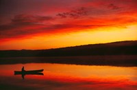 Silhouetted Canoe On Lake Fine Art Print