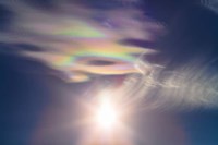 Iridescent clouds near the Sun Fine Art Print