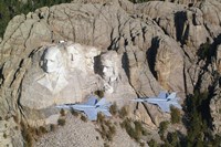 Two F/A-18E Super Hornets conduct a fly by of Mount Rushmore Fine Art Print