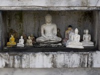 Niche at Ruwanwelisaya Dagoba filled with Buddha statues as offerings, Anuradhapura, Sri Lanka Fine Art Print