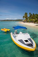 Powerboat and banana boat, Plantation Island Resort, Malolo Lailai Island, Mamanuca Islands, Fiji Fine Art Print