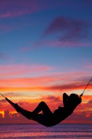 Woman in hammock at sunset, Coral Coast, Viti Levu, Fiji Fine Art Print