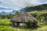 Traditional thatched roofed huts in Navala in the Ba Highlands, Fiji Fine Art Print