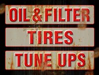 Oil Tires Tuneups Framed Print