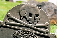 Skull And Crossbones Carved On Tombstone Fine Art Print