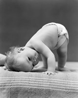 1940s Baby Bending Down With Head On Blanket Fine Art Print