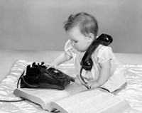 1960s Baby Girl With Telephone Book Fine Art Print