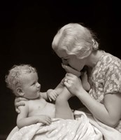1930s Mother Kissing Bottom Of Baby'S Foot Fine Art Print