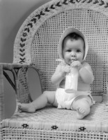1940s Baby Sitting In Wicker Chair Fine Art Print