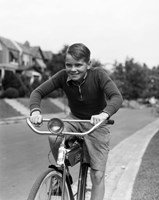 1930s Smiling Boy Riding Bicycle Fine Art Print