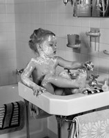 1940s Girl Sitting In Sink Lathered With Soap Fine Art Print