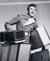 1950s Smiling Bellboy Carrying Four Bags Of Luggage Fine Art Print