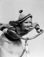 1930s Smiling Eager Little Girl In Knit Cap And Sweater Riding Bike Fine Art Print