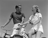 1930s 1940s Smiling Couple On Bikes Looking At One Another Fine Art Print