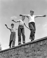 1950s Three Laughing Boys Walking On Top Of Stone Wall Fine Art Print
