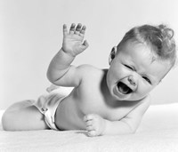 1950s Baby Lying On Stomach Laughing Fine Art Print