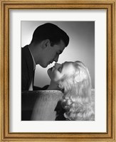 Movie Star Studio Style Romantic Couple Embracing On Sofa About To Kiss Fine Art Print