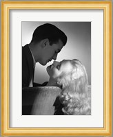 Movie Star Studio Style Romantic Couple Embracing On Sofa About To Kiss Fine Art Print