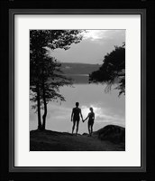 Man And Woman In Bathing Suits Holding Hands Watching Sunset Lakeside Fine Art Print