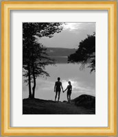 Man And Woman In Bathing Suits Holding Hands Watching Sunset Lakeside Fine Art Print