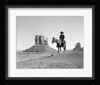 Navajo Indian In Cowboy Hat On Horseback With Monument Valley Rock Formations In Background Fine Art Print