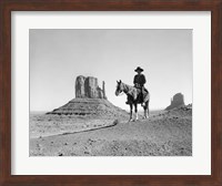 Navajo Indian In Cowboy Hat On Horseback With Monument Valley Rock Formations In Background Fine Art Print