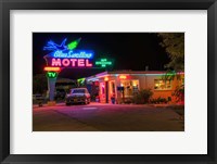 Neon Blue Swallow Motel Framed Print